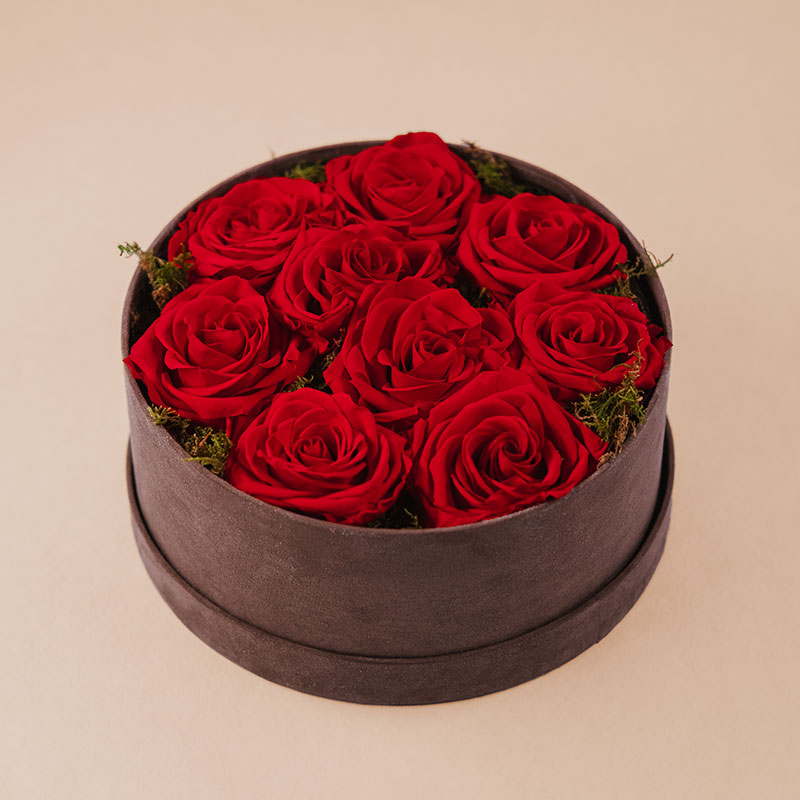 Boîte Cylindre Ø23 cm 9 roses rouges stabilisées