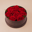 Boîte Cylindre Ø23 cm 9 roses rouges stabilisées